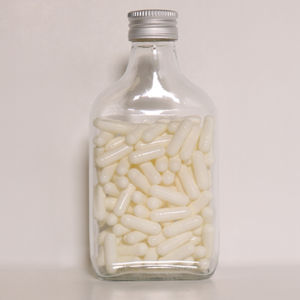 The Bottle (Ungimmicked Bottle and Pills only) by Adrian Vega - magic tricks